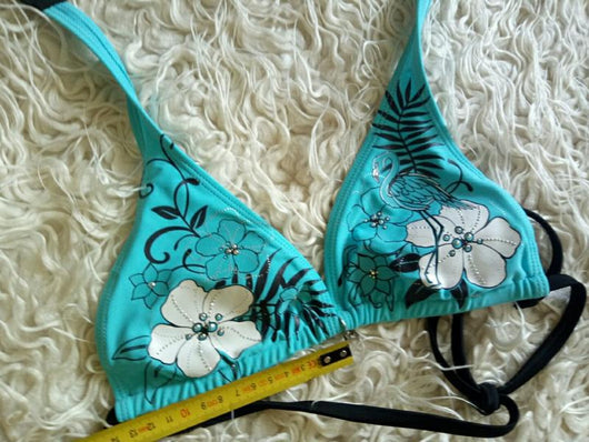 Black halter bikini suit with boy short bottoms, featuring pink and blue floral and flamingo patterns. - Image 17