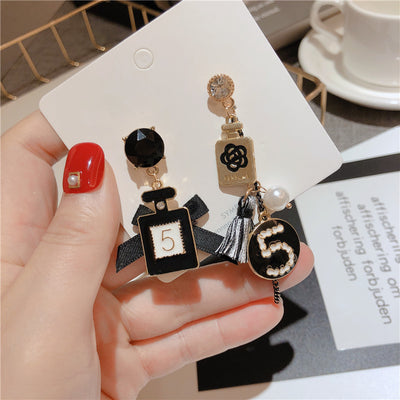 Aretes Circulares Dorados con Perla y Moño - Diseño Elegante y Trendy - Image 10
