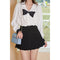 Blusa Elegante con Cuello Diseñador y Lazo Manga Larga
