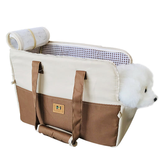 Two-tone beige and brown canvas pet carrier bag with mesh top and a small white dog peeking out. - Image 5
