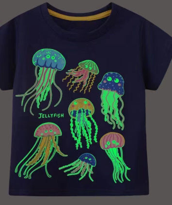 Dark blue short-sleeved children's t-shirt with multiple glowing jellyfish graphics and a yellow neck trim. - Image 9