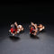 Aretes de Granate Natural Forma Pera en Oro Rosado