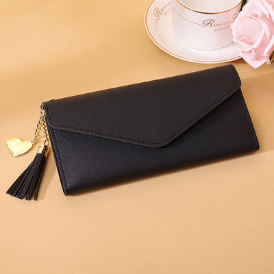 Bolso de mano con borlas decorativas - Image 14