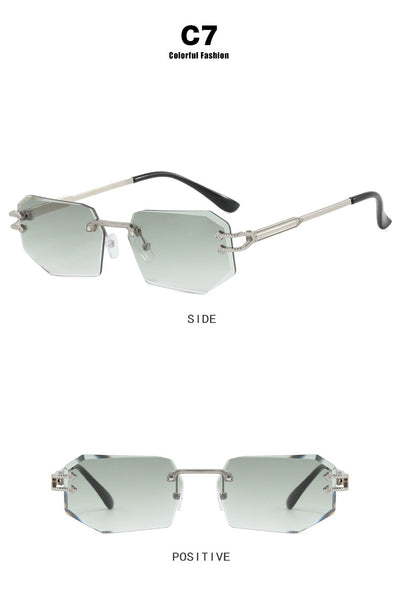 Rimless octagonal clear lens glasses with silver-toned metal temples and black ear tips, featuring decorative accents. - Image 13