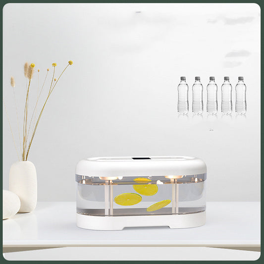 Dark green and clear oval USB humidifier with two mist outlets, shown next to its white product box. - Image 2