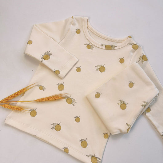 Light yellow infant long-sleeved pajama set with milk bottle and cookie print, suitable for homewear. - Image 20