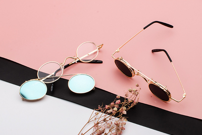 Retro round sunglasses with vibrant red lenses and a black metal frame, featuring a unique flip-up design. - Image 13