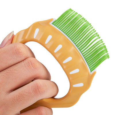 Peine Deslanador para Perros y Gatos - Cepillo Masajeador de Forma Concha para Eliminar Pelo Suelto - Image 6