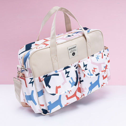 Bolso Maternal Bandolera Elegante con Diseño Asimétrico - Image 14