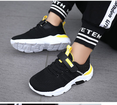 Boy's black and blue sports shoes with orange accents, mesh upper, white sole, blue laces, and a Velcro strap. - Image 43