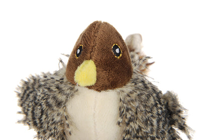 Silver tabby cat playing with a plush bird toy featuring brown and patterned feathers, a brown head, and a yellow beak. - Image 8