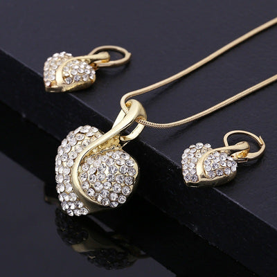 Aretes y Collar de Circonita en Forma de Corazón - Image 11