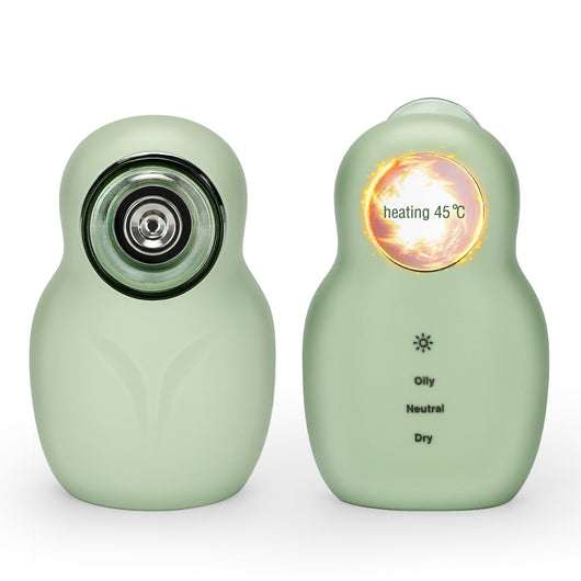 White blackhead vacuum remover with rose gold accents, clear suction head, and control buttons for strong, normal, and soothe modes. - Image 11