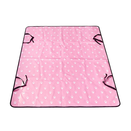 Pink car pet mat with white paw print and bone patterns, featuring black straps for securing to a rear seat. - Image 10