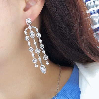 Aretes Largos de Cobre con Circonita Geométrica y Borla para Mujer - Image 8