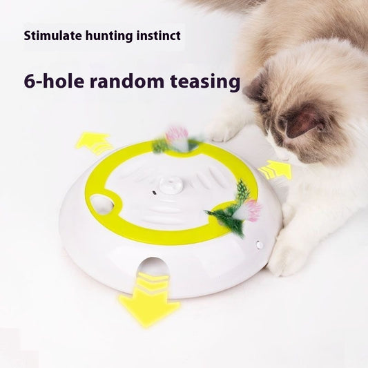 Electric cat toy with white and lime green base, feather attachment, and two replacement feather heads.