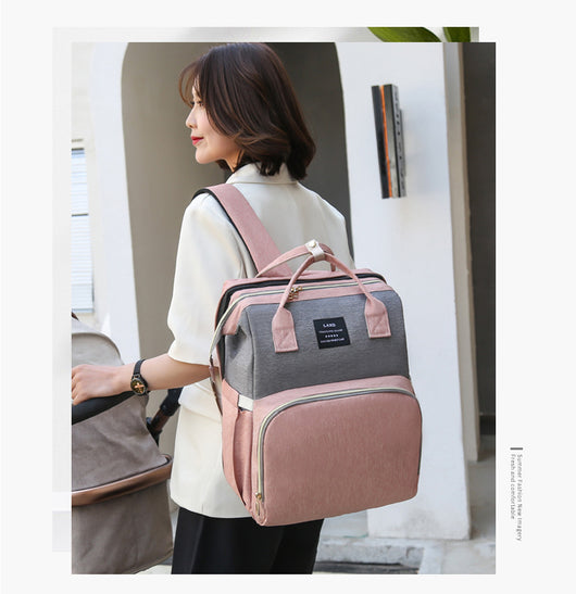 Mochila Maternal Multifuncional con Red Antimosquitos, Capacidad Grande y Cuna Plegable - Image 27