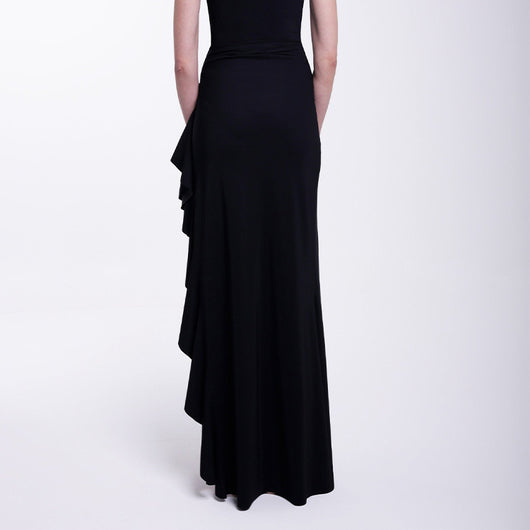 Black one-piece swimsuit with a deep V-neckline and white horizontal stitching detail across the plunge. - Image 17