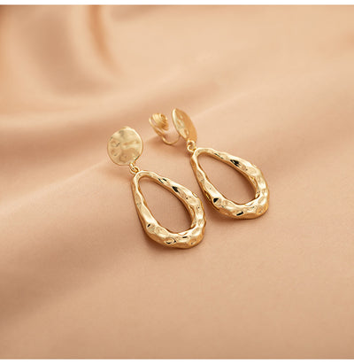 Aretes Colgante Gota de Agua Hueca Dorados Estilo Fashionable - Image 9