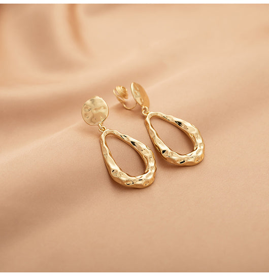 Aretes Colgante Gota de Agua Hueca Dorados Estilo Fashionable - Image 9