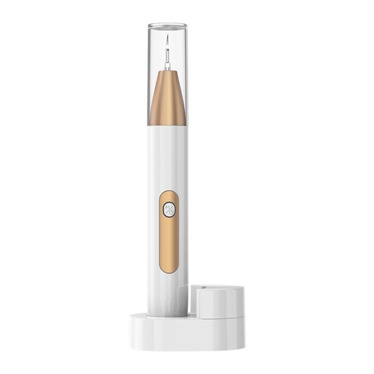 White and gold ultrasonic tooth cleaner with a pointed metal tip, standing in a white charging base. - Image 11