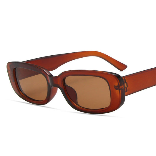 Black rectangular fashion sunglasses with dark lenses, featuring a thick frame and temples, angled on a white background. - Image 26