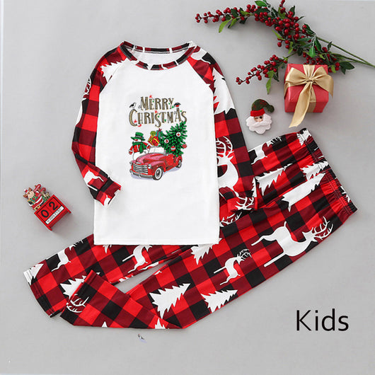 Matching family Christmas pajamas in red and black buffalo plaid with a vintage car, snowman, and 'Merry Christmas' graphic. - Image 3