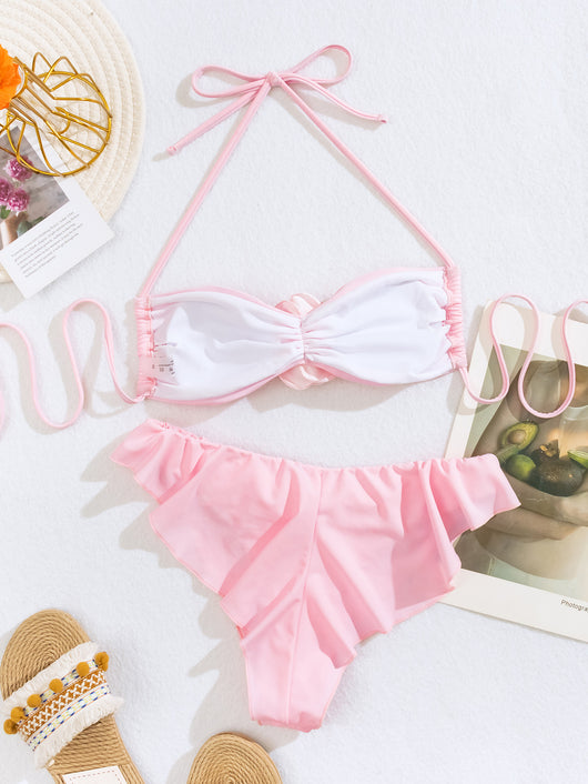 Women's pink halter bikini with a 3D flower on the top and ruffled edges on the bikini bottom. - Image 11