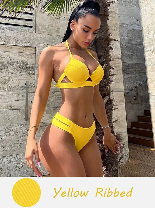 Yellow ribbed bikini with a halter neck top and high-cut bottoms, modeled by a woman outdoors. - Image 5