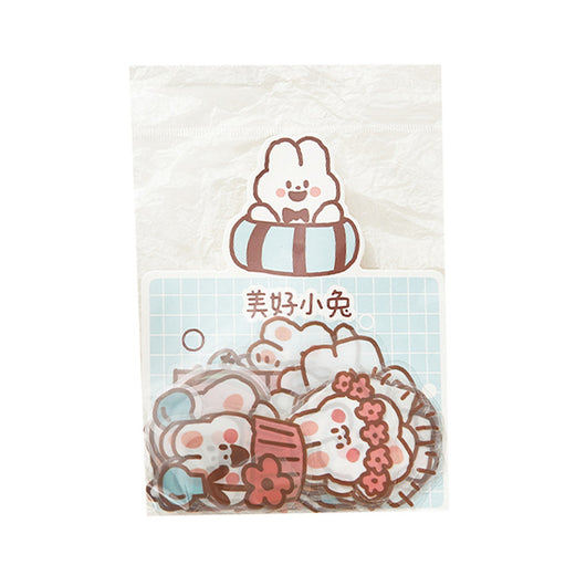 40-piece pack of cute white bunny PET stickers with pink outlines, showing the bunny in various activities like driving, fishing, and holding flowers, on a pink - Image 2