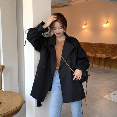 Abrigo Cortaviento Negro Holgado con Mangas Linterna - Diseño Versátil Midi para Mujer