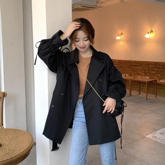 Abrigo Cortaviento Negro Holgado con Mangas Linterna - Diseño Versátil Midi para Mujer