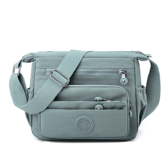 Bolsa Crossbody de Nylon Ligera con Gran Capacidad - Image 11