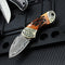 Cuchillo Plegable de Acero Damasceno con Mango de Hueso de Res y Latón Puro