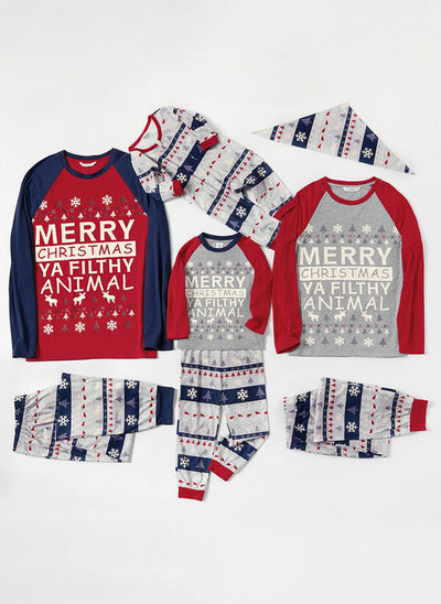 Family of three wearing matching Christmas pajamas with "Merry Christmas Ya Filthy Animal" print and festive patterns. - Image 5