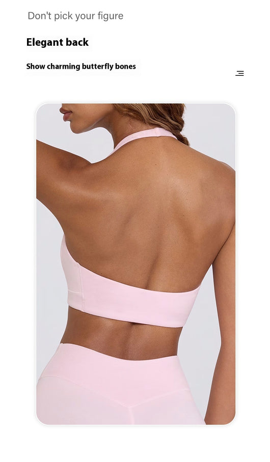 Light pink halter neck sports bra and high-waisted leggings workout set on a model. - Image 42