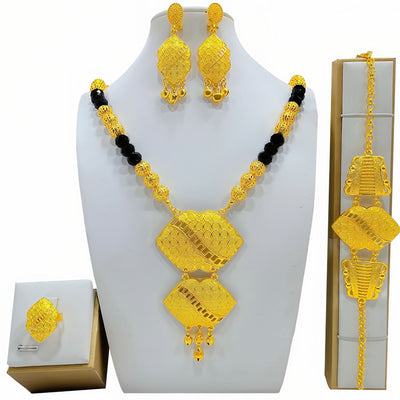 High-end gold-tone bridal wedding jewelry set with necklace, crescent earrings, ring, and bracelet, featuring intricate patterns and clear beads. - Image 5