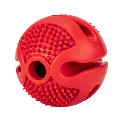 Red rubber pet chew toy ball with textured nubs and four openings for dispensing treats. - Image 7
