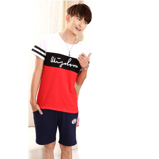 Young girl in a white short-sleeve t-shirt with a black stripe and black shorts, wearing a black cap. - Image 12