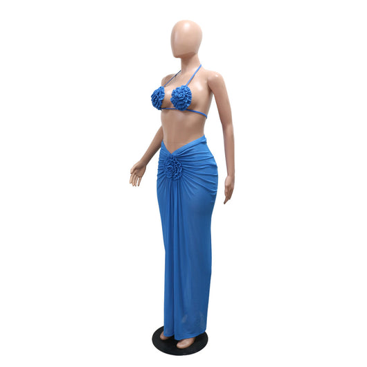 Blue three-piece bikini set with floral appliques on the triangle top, thong bottom, and matching ruched maxi skirt. - Image 14