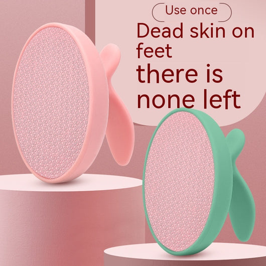 Pink oval nano foot grinder with a textured surface and ergonomic handle, designed for exfoliating and removing calluses. - Image 5