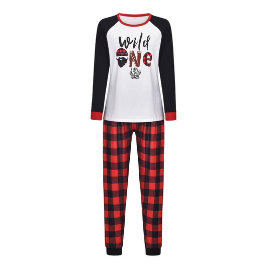 White long-sleeve pajama top with "wild one" graphic and red and black plaid pants. - Image 2