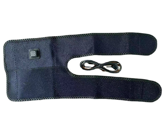 Black electric heating kneecap cover with hot compress massage, shown on a leg with a hand pressing the power button, indicating heat. - Image 13