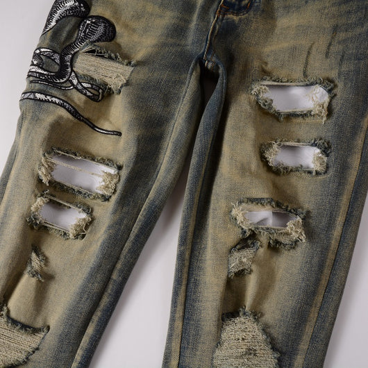 Jeans Slim Fit Desgastados con Bordado de Serpiente de Tres Cabezas y Parches de Cuero - Image 10