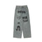 Pantalones Anchos Estilo Urbano con Estampado Cartoon Desgastado para Hombre