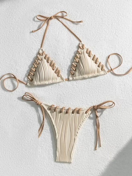 Light blue ribbed bikini swimsuit with pink tie straps and lacing detail, featuring a triangle top and thong bottom. - Image 17
