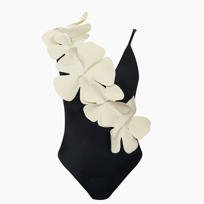 Light pink one-piece bikini with large cream floral appliques on the left shoulder and torso, worn by a woman. - Image 6