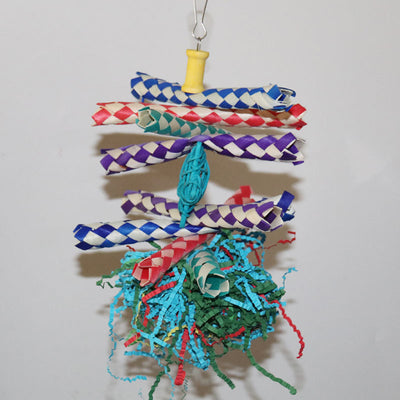Colorful bird gnawing toy with braided paper strips, shredded paper, and woven balls, hanging from a hook.