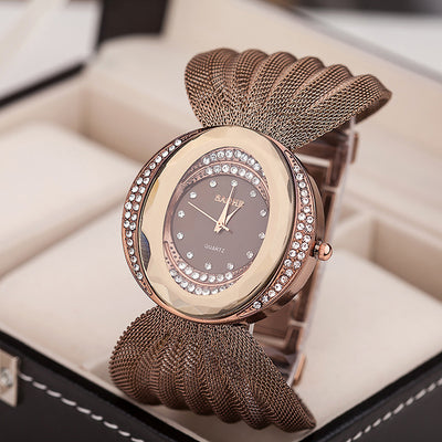 Reloj de Moda para Mujer con Malla Dorada y Plateada - Image 10