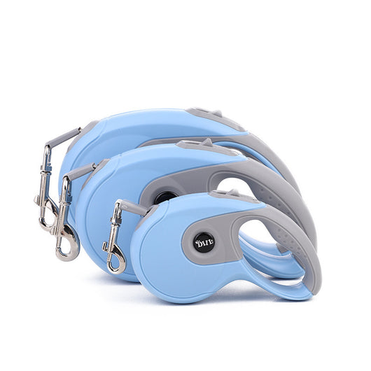 Blue and grey retractable dog leash with a black waste bag dispenser and a silver metal clip. - Image 24